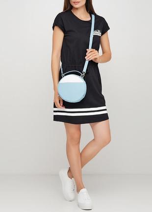 Жіноча кругла блакитна сумка через плече1 фото
