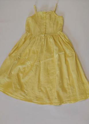 Летнее платье жатка с вышивкой в мелкие цветочки желтого цвета 6-7 лет7 фото