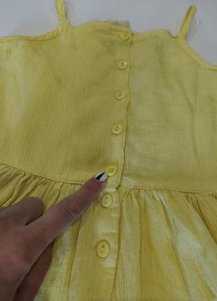 Летнее платье жатка с вышивкой в мелкие цветочки желтого цвета 6-7 лет10 фото