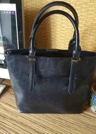 Красивая,практичная сумка,темно- синего цвета.4 фото