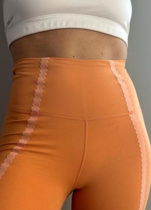 Спортивні жіночі  легінси nike yoga 7/8 eyelet leggings6 фото