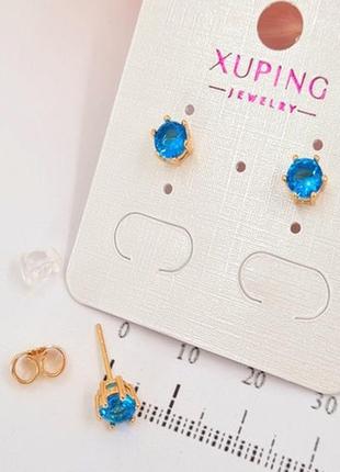 Сережки гвоздики золоті з блакитним каменем xuping, жіночі сережки з синім каменем під золото біжутерія1 фото