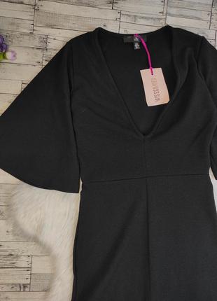Жіночий літній комбінезон missguided чорний з глибоким декольте розкльошені штани розмір s 443 фото