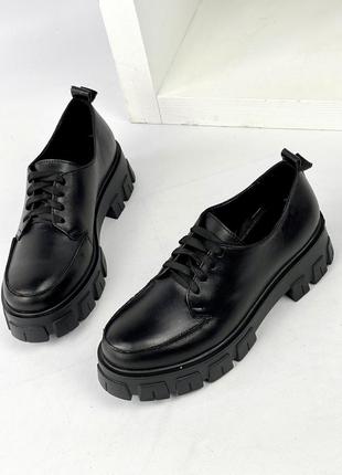 Черные туфли на высокой подошве7 фото
