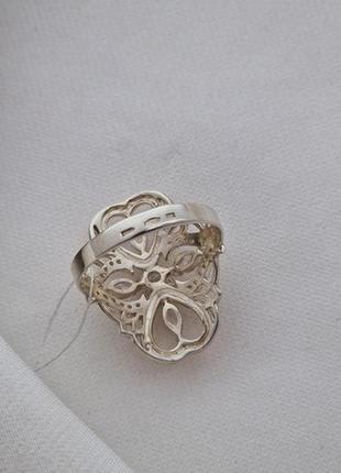 Кольцо серебряное с золотыми напайками и цирконами разного размера6 фото