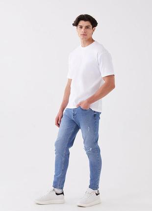 Чоловічі джинси рвані lc waikiki slim fit блакитні розмір 361 фото