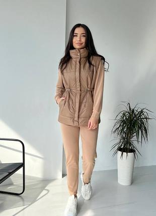 Женская жилетка