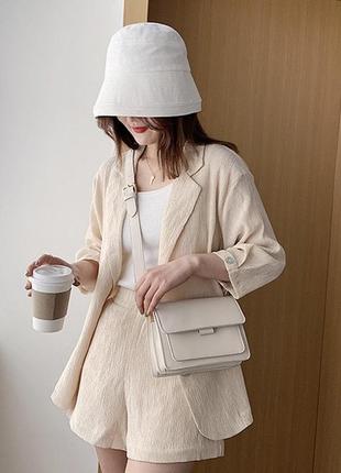 Женская классическая сумочка на ремешке кросс-боди через плечо на три отдела белая молочная5 фото