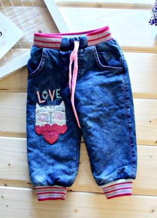 Нові дитячі теплі джинси на дівчинку 9-12 місяців з кішечкою.5 фото