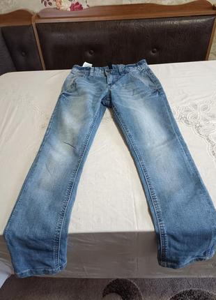Джинсы фирменные 8-9