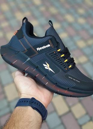 Теплі зимові кросівки reebok zig kinetica сірі з помаранчевим чоловічі зимові кросівки рибок кінетік1 фото