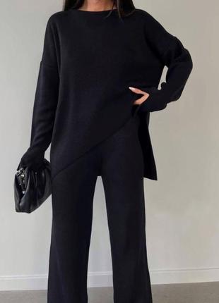 Женский черный теплый костюм с свободным свитером с свободными длинными штанами2 фото