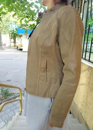 Шкіряна ,коротенька куртка3 фото