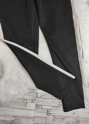 Жіночий костюм tlovka комплект піджак і чорний штани з білими лампасами розмір м 468 фото