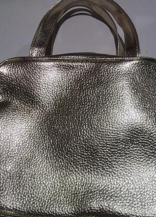 Золотиста косметичка