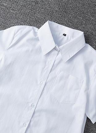 Жіноча сорочка біла короткий рукав 7302 карман класична рубашка в школу форма білосніжна мінімалізм5 фото