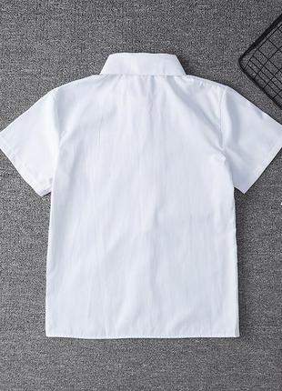 Жіноча сорочка біла короткий рукав 7302 карман класична рубашка в школу форма білосніжна мінімалізм7 фото