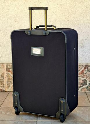 Большой чёрный чемодана voyager 257 с большим  увеличением размера3 фото