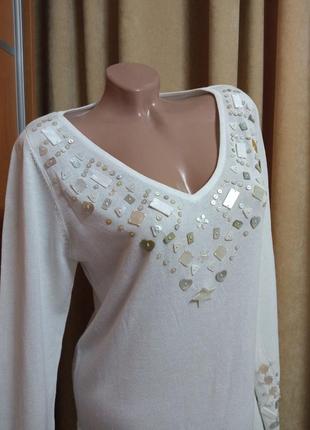 Эластичная блузка украшена перламутровыми пуговицами3 фото