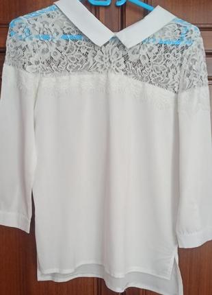 Біла блузка