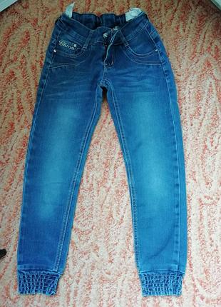 Джинсы на девочку 8 лет