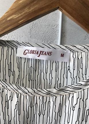 Жіноча блузка7 фото