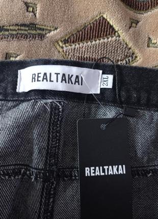 Джинсы от бренда real takai.5 фото