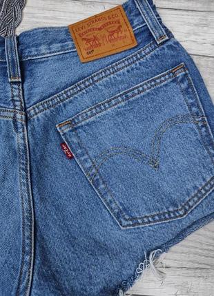 Жіночі джинсові шорти levi's сині розмір 256 фото