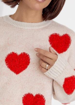 Жіночий в'язаний светр оверсайз з сердечками.8 фото