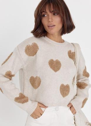 Жіночий в'язаний светр оверсайз з сердечками.9 фото
