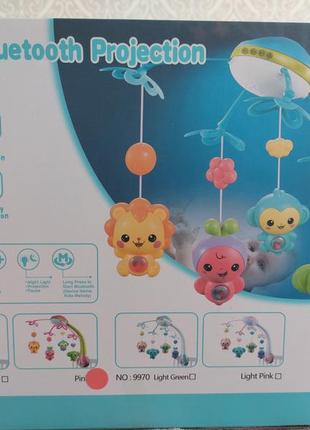 Карусель на кроватку с проектором звездного неба с пультом