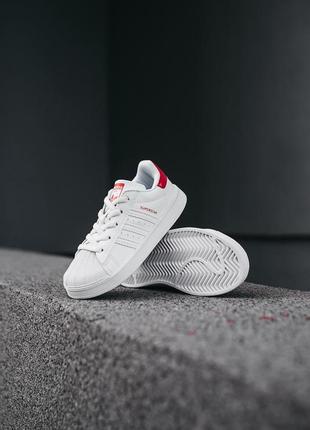 Детские белые кроссовки adidas superstar6 фото
