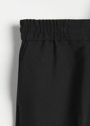 Чорні еластичні брюки на талії reserved3 фото