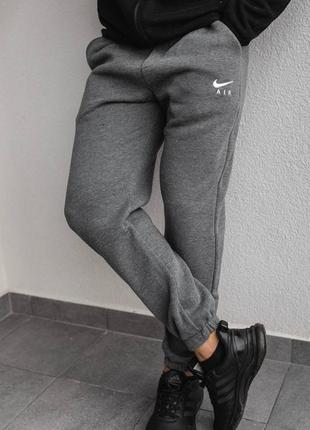 Мужские спортивные штаны чоловічі зимові штани спортивні з насосом nike air2 фото