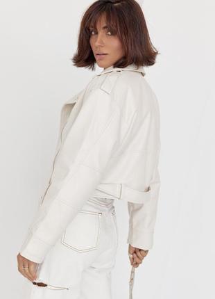 Жіноча куртка-косуха зі шкірозамінника

еко шкіра чорна сіра беж молочна10 фото