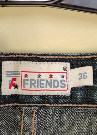Актуальная джинсовая юбка миди с разрезом спереди6 фото