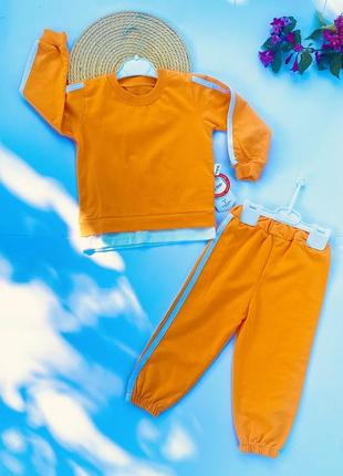 Яскравий дитячий костюм на літо жовтогарячий1 фото