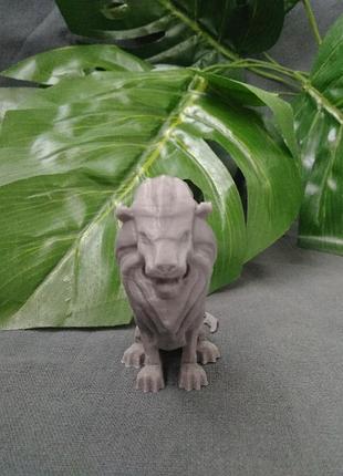 Статуетка лев