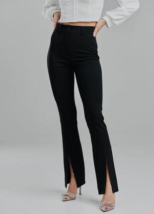 Брюки женский клешные черные штаны стрейчевые с розрезами пояс кокетка morgan- s1 фото