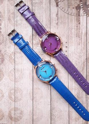 Sale.шикарні годинник без цифр з гравірованим склом.4 фото