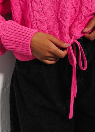 Укорочений в`язаний джемпер рожевий із зав`язками внизу2 фото