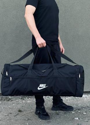 Велика спортивна дорожня чорна сумка nike1 фото