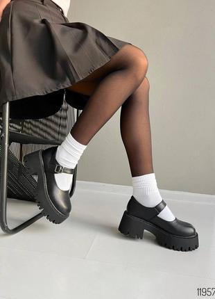 Черные кожаные туфли с ремешком на толстой грубой высокой подошве платформе7 фото