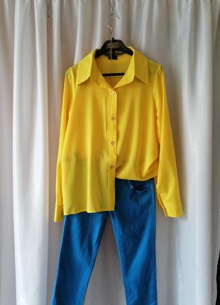Красива яскрава жовта блуза сорочка розмір на бирці вказаний 44 ширина плечей 35 см напівобхват груд4 фото