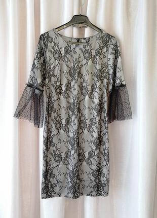 Платье из стрейчевой ткани с эффектом гипюра широким воланом на рукавах из нежнейшей фатиновой сетки1 фото