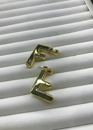 Брендові сережки стиль fendi у позолоті