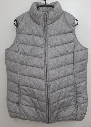 Жіноча жилетка