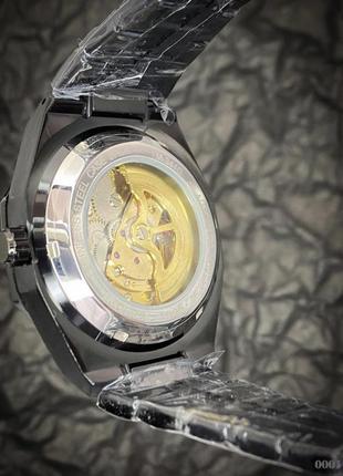 Часы наручные gusto skeleton black-gold3 фото