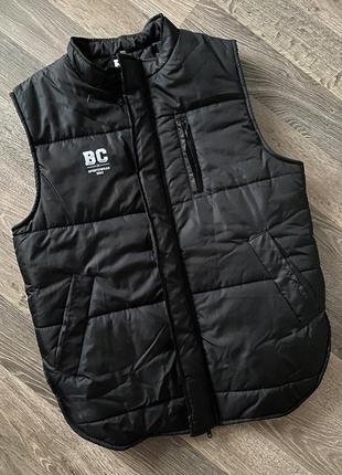 Стеганая жилетка