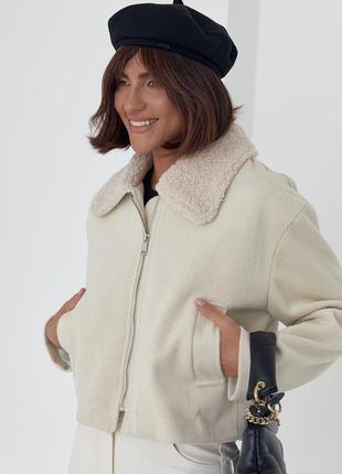 Жіноче коротке пальто в ялинку2 фото